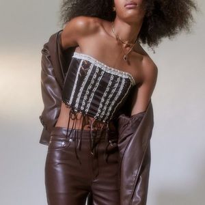 Brown silk and white lace corset top.